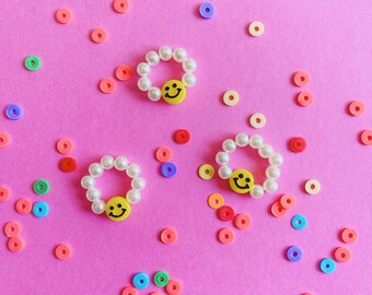 Anillo de perlas: Anillo con cara feliz para niños y adultos