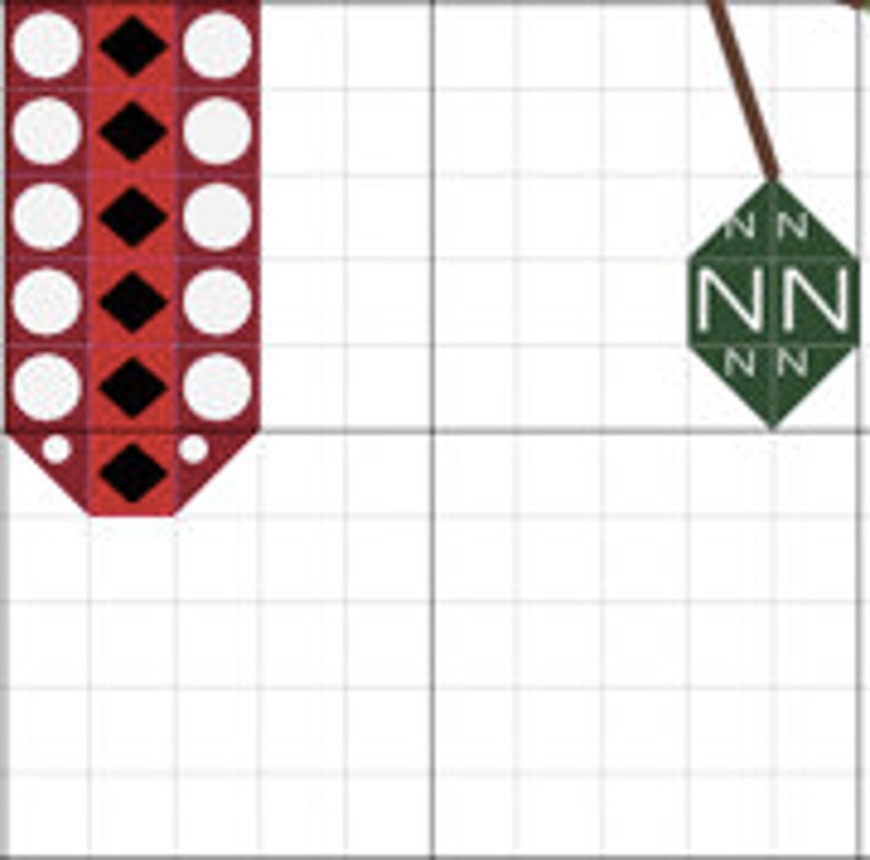 May include: A cross-stitch pattern chart with a red and white design on the left and a green and white design on the right. The red design features white circles and black diamonds. The green design has the letters "NN" in white.