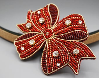 Broche noeud rouge, broche perlée noeud de Noel, bijoux de Noel, accessoire fille noeud, broche châle écharpe veste cristal