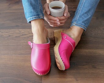 pink wooden clogs