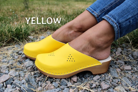 Yellow wooden hotsell clogs