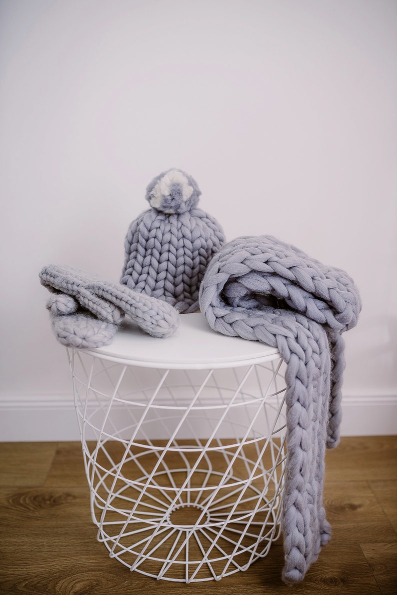 set of gray super chunky knit scarf mittens and pom pom beanie