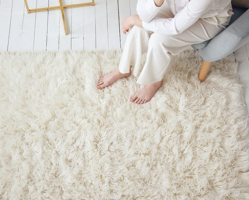 off white area rug is fluffy and soft