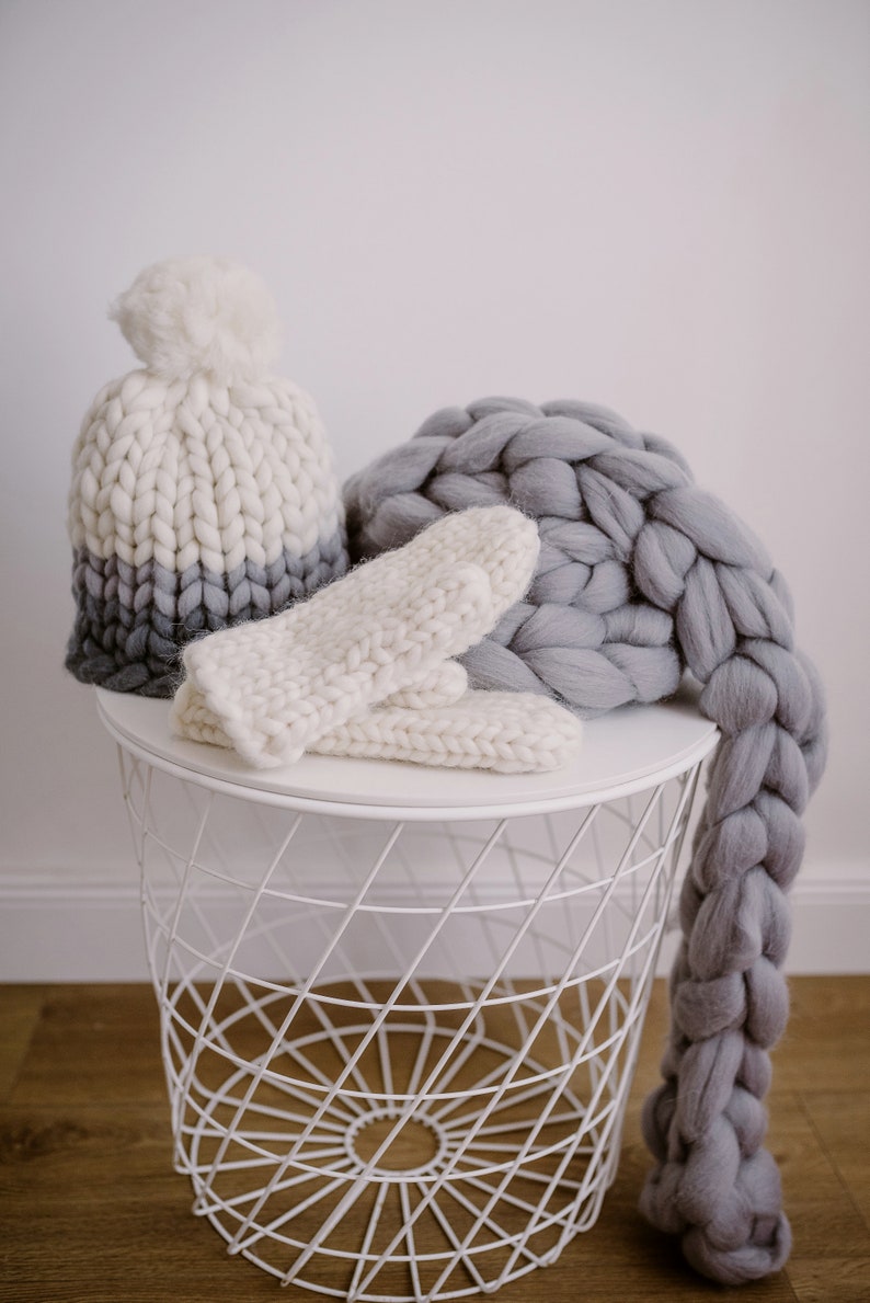 set of mittens scarf and pom pom beanie in white and grey mix
