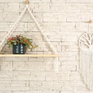 boho style shelf and wall hanging made of natural macrame cotton rope