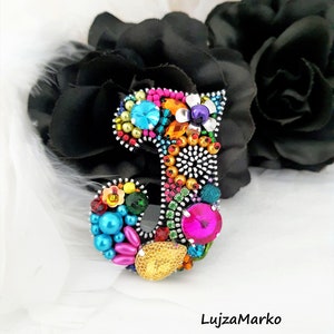 Broche com zíper "J like Jane"