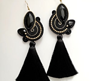 Elegant gold and black earrings with black tassel