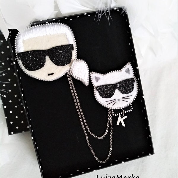 Brooch fashion guru "Karl with his cat Choupette"