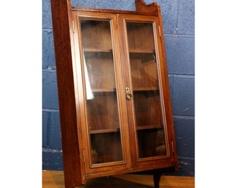 A Slender Victorian Walnut Glazed Two Door Hanging Wall Cabinet