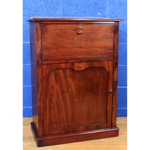 A Victorian Mahogany Campaign Style Fall Front Bureau over Cabinet with Fitted Interior
