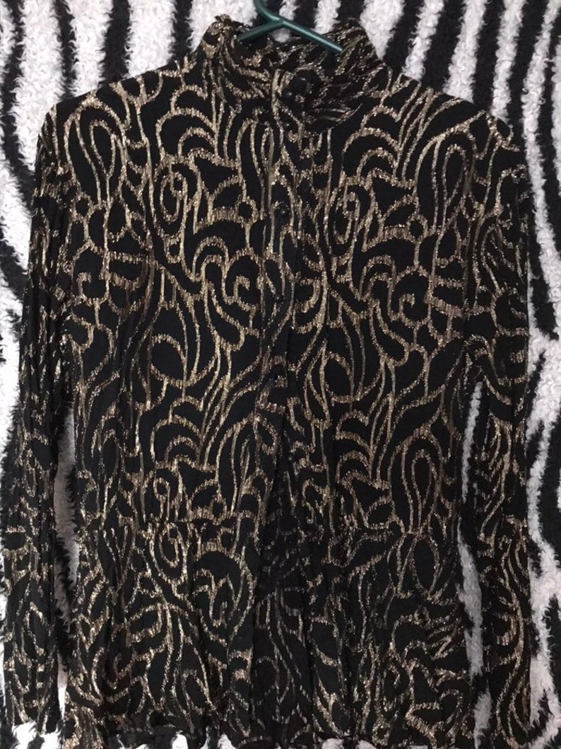 Amazing vintage 1970s 1980s black and gold Sparkle glitter metallic lurex roll high neck blouse.