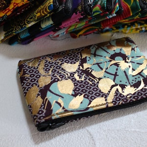Coin purse, zipped wax pouch approximately 12 X 8 cm
