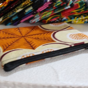 Coin purse, zipped wax pouch approximately 12 X 8 cm