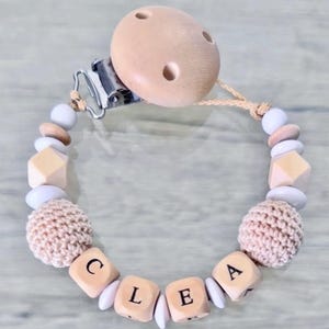 unisex pacifier clip. wood, beige and white crochet beads