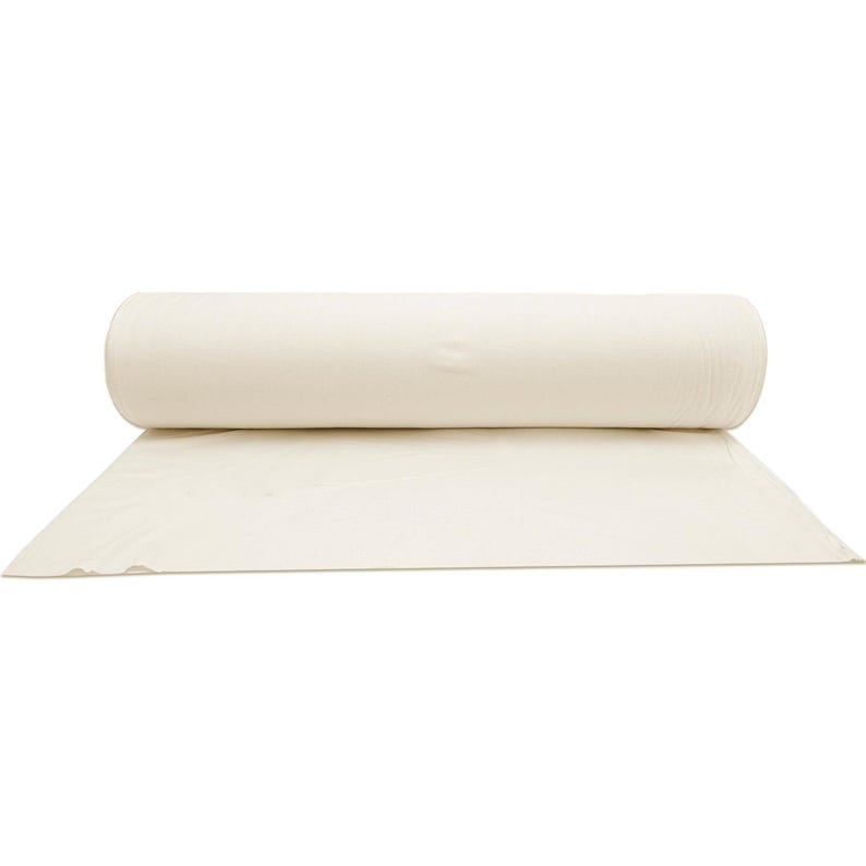 May include: A roll of white plastic sheeting, commonly used for protecting surfaces during painting or construction projects.