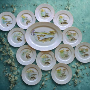 Rare Set of 12 Vintage Limoges Fish Plates with Matching Serving Platter – French Porcelain River Scene Collection