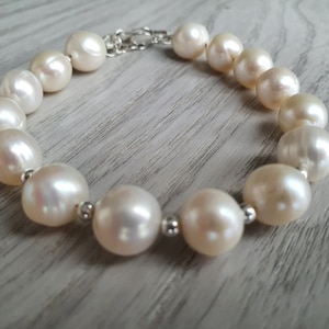 Bracelet white pearls classic with sterling silver deads, support Ukraine