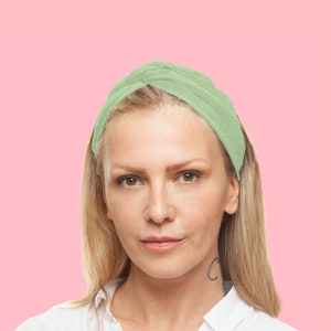 Light green wired headband from hand loomed raw cotton.
