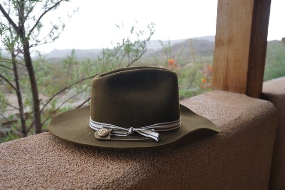 green felt cowboy hat