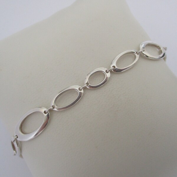 A sterling silver open link bracelet approx. 7" or 18 cm 9.05 grams