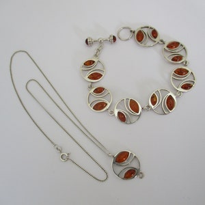 A sterling silver stamped 925 panel bracelet and necklace set 19.86 grams