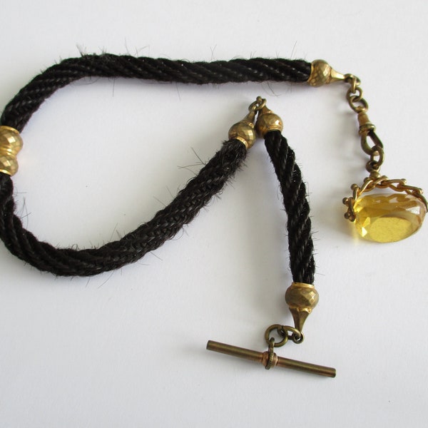 A Victorian antique woven hair Albert watch chain with citrine fob and t bar Albertina