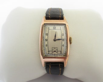 A 1930's 9 carat 9ct gold Rotary watch approx. 38 x 20 mm working gold Swiss watch