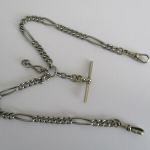 An antique NCR Co National cash register company double albert pocket watch chain with t bar and dog clip clasps