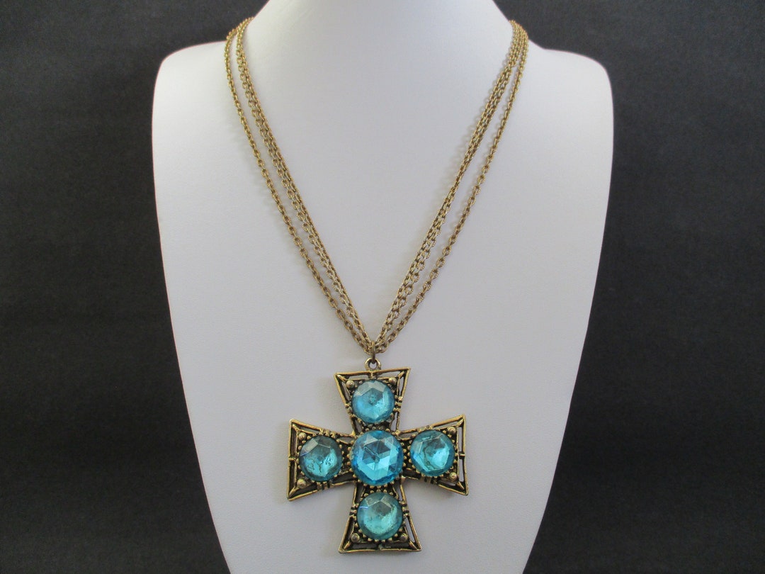 A Vintage Large Gold Tone Cross Pendant Necklace With Blue Glass Stones