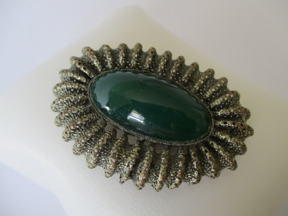 Green stone deals brooch