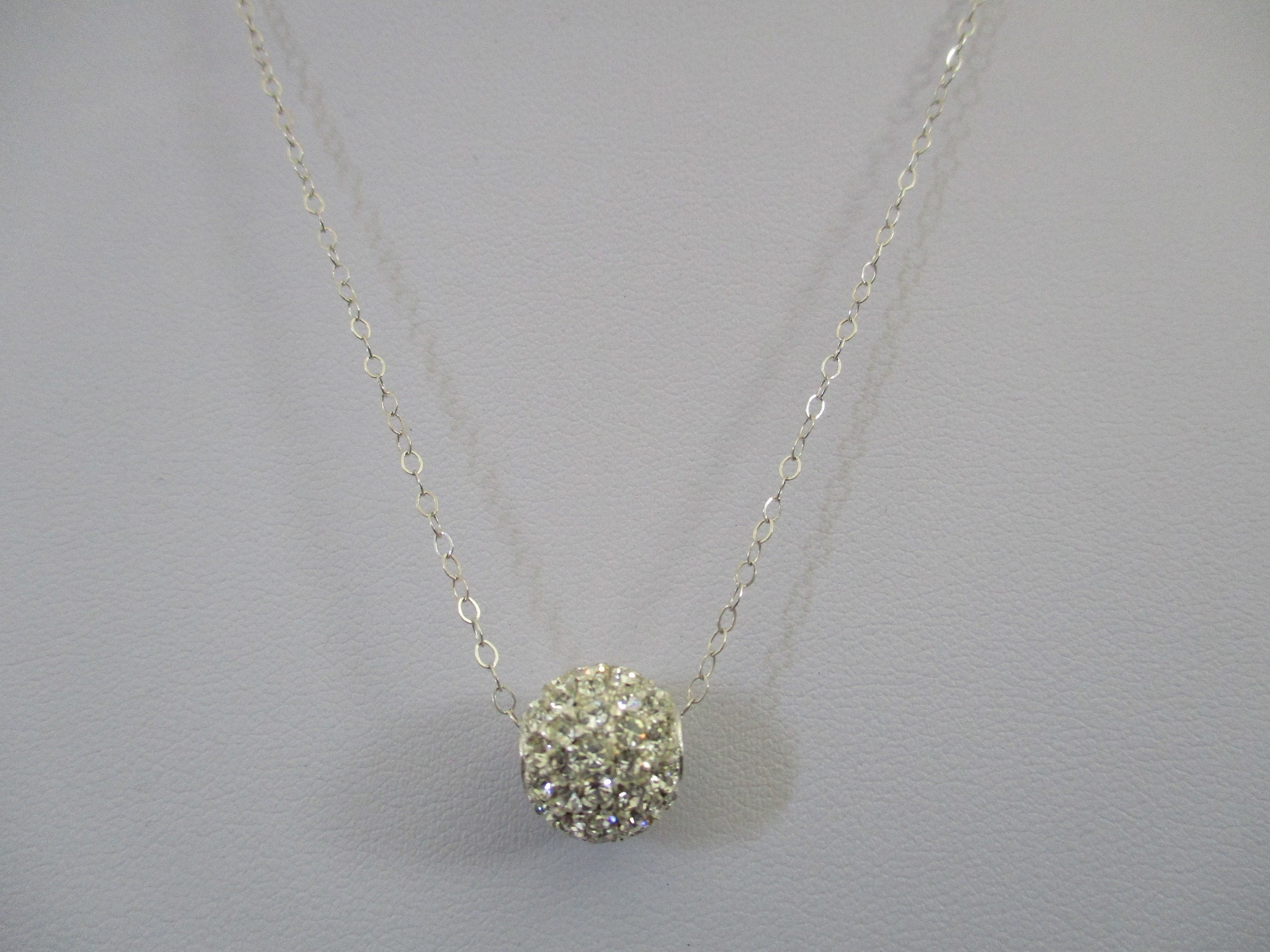A sterling silver stamped 925 on clasp chain necklace with faceted crystals ball pendant charm