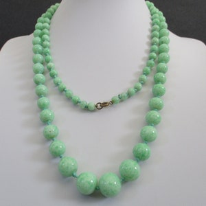 An Art Deco era Peking glass Czech green glass bead Flapper length necklace approx. 39" or 100 cm