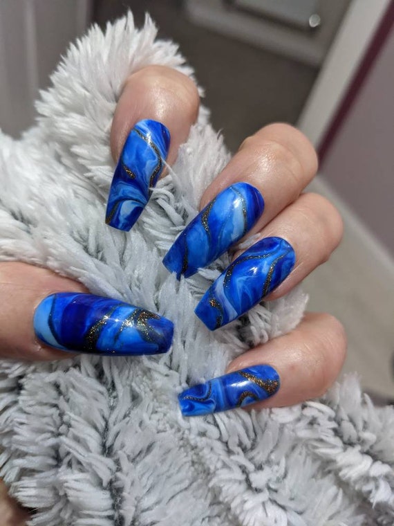 Elegance Beauty - How unreal🤩blue marble acrylic set by Mia💧💎#gelnails  #gelbottle #acrylicnails #marbleacrylic #bluenails #beautyqueen #nailtech  #cheshirebeauty #middlewichbeauty | Facebook