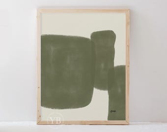May include: Abstract art print in a wooden frame. The artwork features olive green brushstrokes on a cream background. The print has a minimalist design with three overlapping shapes. The artist's signature is in the lower right corner.