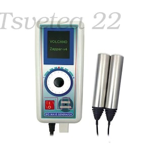 May include: A white and blue Bio Wave Generator with the text "VOLCANO Zapper-v4" on the screen. Two silver cylindrical probes are connected to the device. The device has a red power button and a dial.