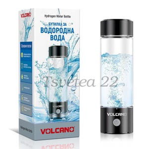 Op de afbeelding: Een zwarte en transparante waterstoffles met de merknaam "VOLCANO" op de basis. De fles is cilindrisch met een zwarte boven- en onderkant. De doos ernaast heeft hetzelfde flesontwerp en tekst in een vreemde taal.