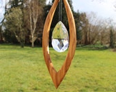 Window decoration large sail, olive wood with lead crystal