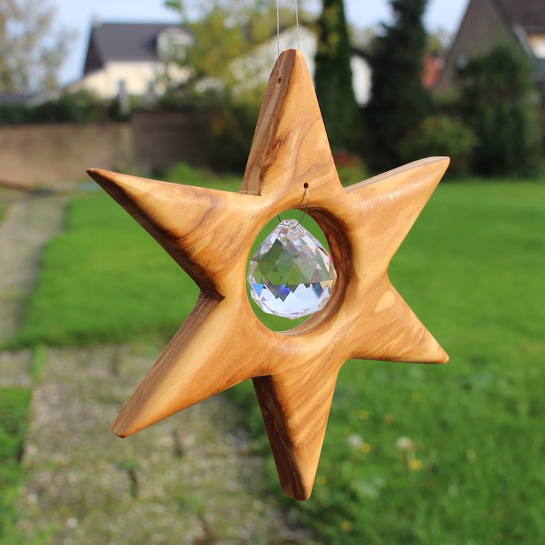 Star window decoration made of wood with lead crystal Christmas decoration