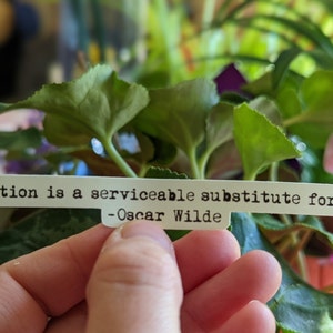 Oscar Wilde Quote Vinyl Sticker | Typewriter Font | &quot;Quotation is a servicable substitute for wit&quot;