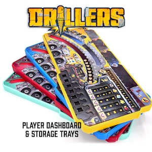 May include: A set of four stacked board game player dashboards and storage trays in yellow, blue, red, and light green. Each tray features a complex printed surface with numerical tracks, icons, and recessed slots. The text DRILLERS is at the top.
