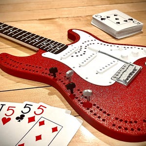 Planche de cribbage pour guitare rock