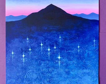 May include: An original painting depicting a mountain silhouette against a pink and blue sky. The foreground features a dark blue body of water with concentric circles and sparkling star-like reflections.