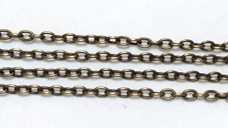 Antique bronze cross chain by the foot 2mm by 3.5mm link