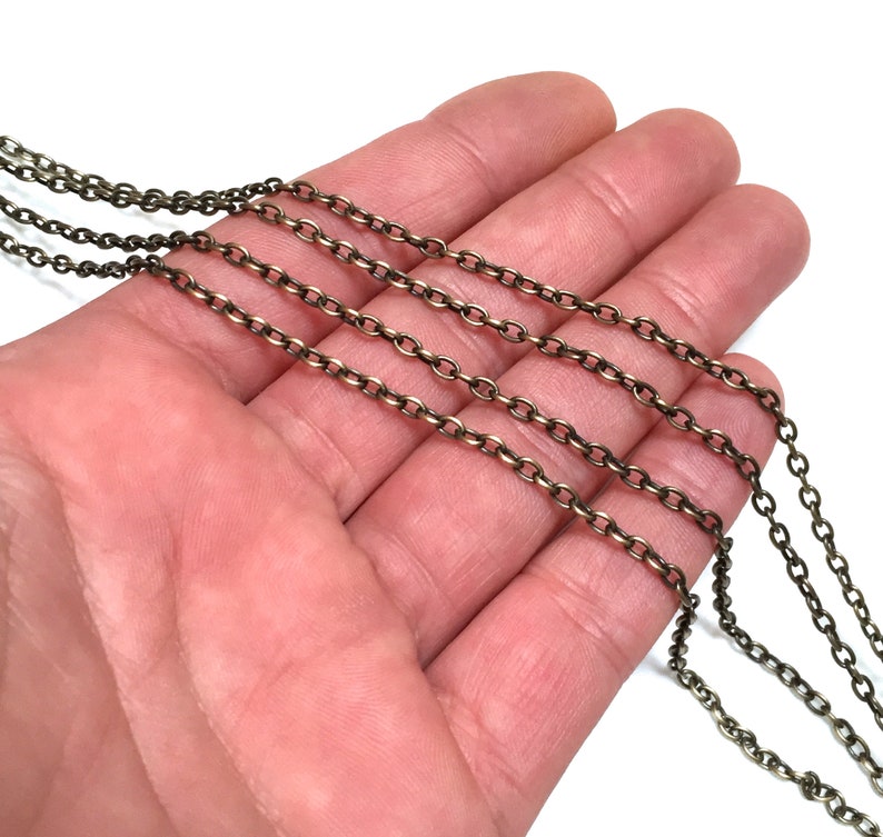 Antique bronze cross chain by the foot 2mm by 3.5mm link