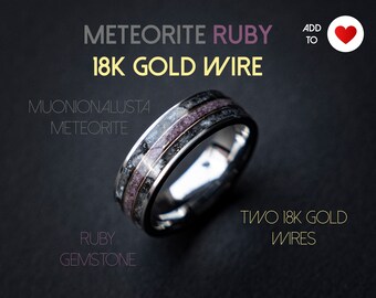 Peut inclure: Une bague en météorite avec deux fils d'or 18 carats et une pierre précieuse en rubis. La bague est faite de météorite de Muonionalusta et est livrée avec un certificat.