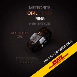 May include: A black ring with a multi-colour opal inlay. The ring is made of meteorite and T-Rex fossil. The ring comes with a certificate. "SHIPS IN 1-2 BUSINESS DAYS" is written on a yellow and black background.