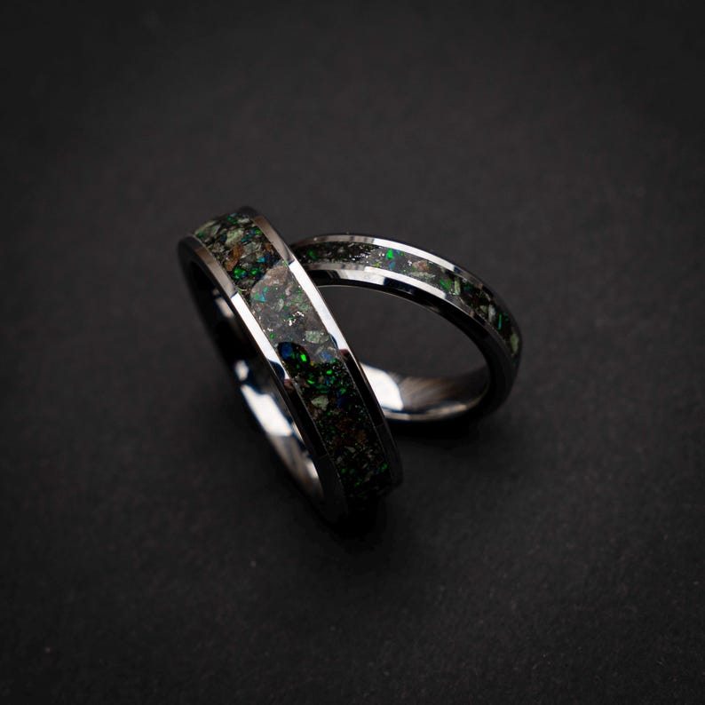 dinosaur fossil ring set, tungsten wedding band set, dark green opal ring, meteorite wedding band, glow inlay ring, unique couples ring set, engraved wedding rings, fossil gemstone ring, cosmic wedding band