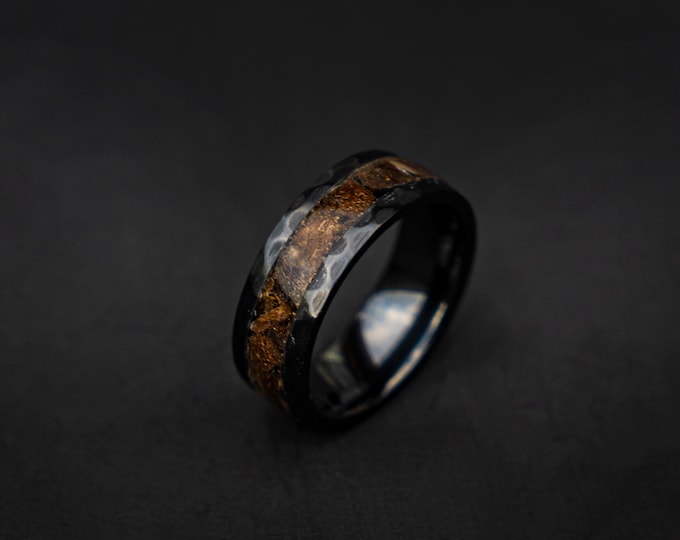 Velociraptor fragments in a black ceramic faceted hammered band,  engagement ring, mens ring, handmade wedding band, mens wedding band