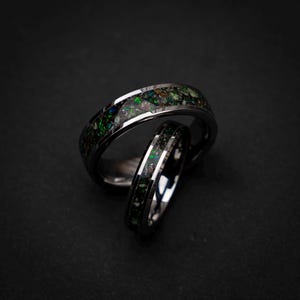 dinosaur fossil ring set, tungsten wedding band set, dark green opal ring, meteorite wedding band, glow inlay ring, unique couples ring set, engraved wedding rings, fossil gemstone ring, cosmic wedding band