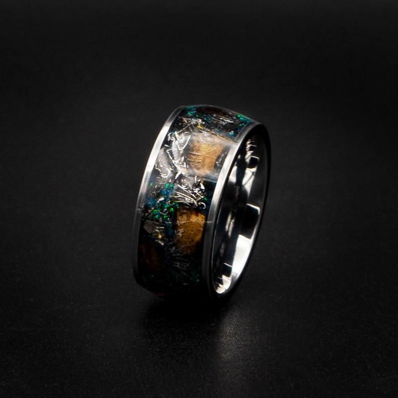 Dinosaur bone ring with Genuine tyrannosaurus and meteorite shavings. image 2